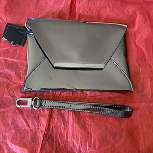 - NWOT BCBG MAXAZRIA SILVER MIRRORED ENVELOPE CLUTCH.